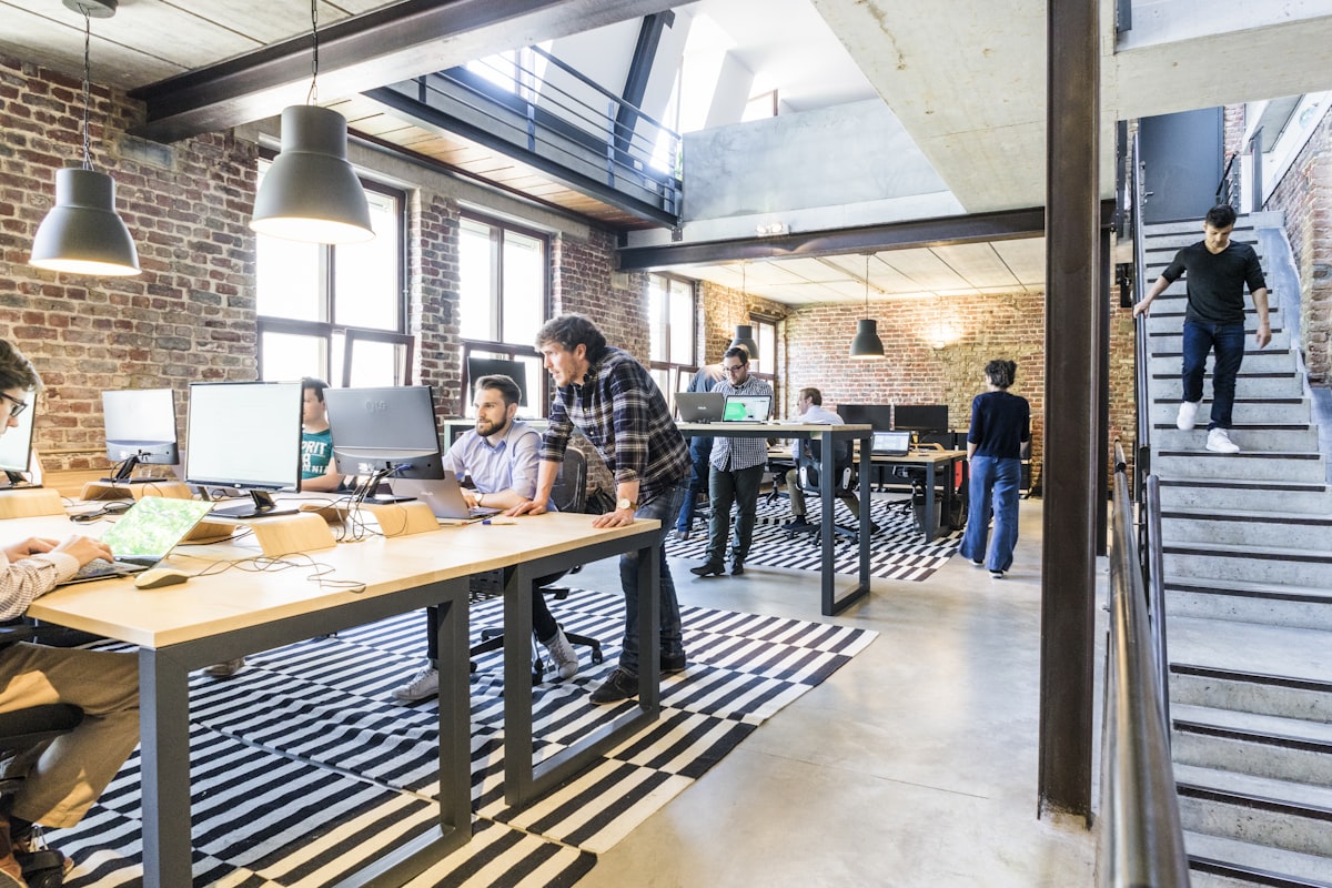 Startup founder working with development team on product roadmap